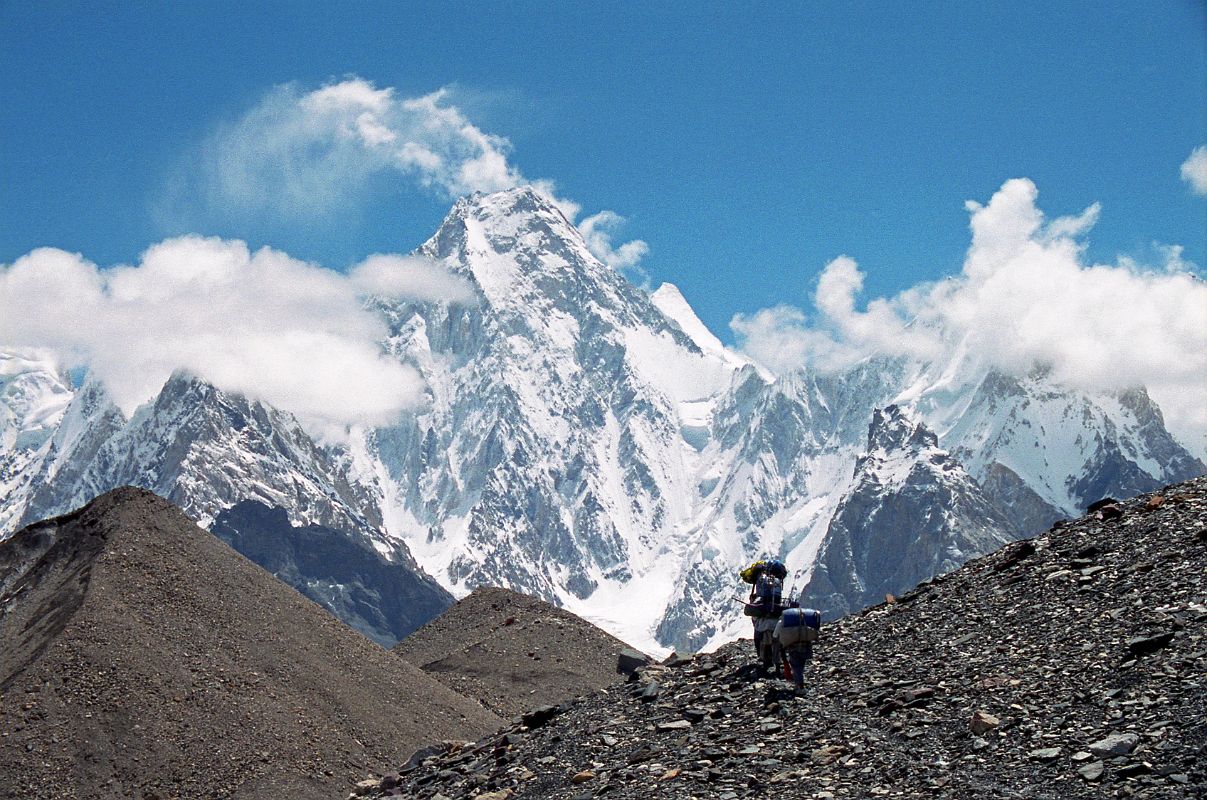 36 Porters Nearing Concordia With Gasherbrum IV Towering Overhead